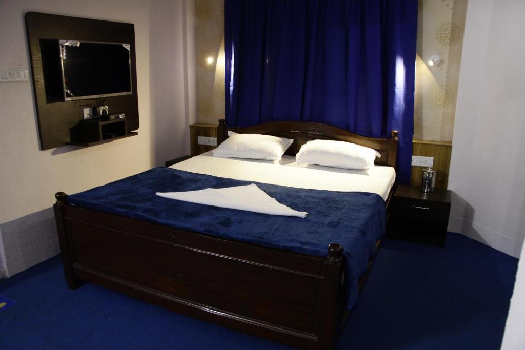 Postel nebo postele na pokoji v ubytování Hotel Paradiso