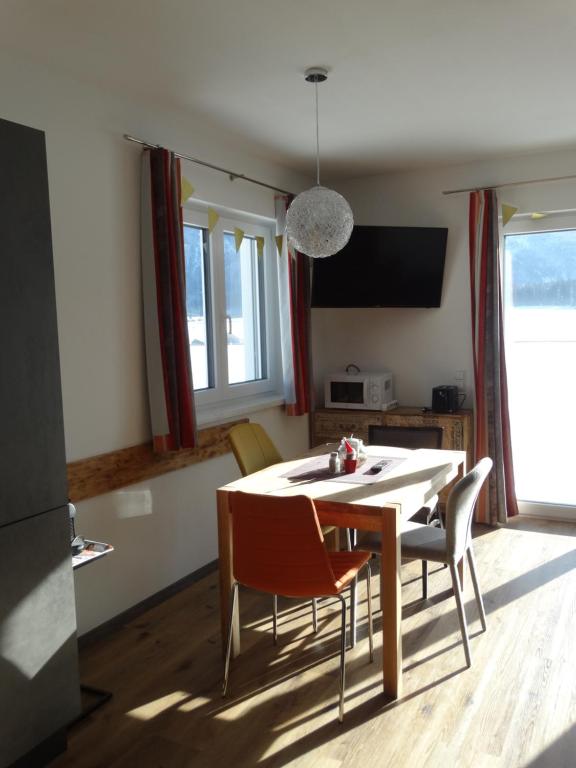 A television and/or entertainment centre at Alpenapartments Steiermark