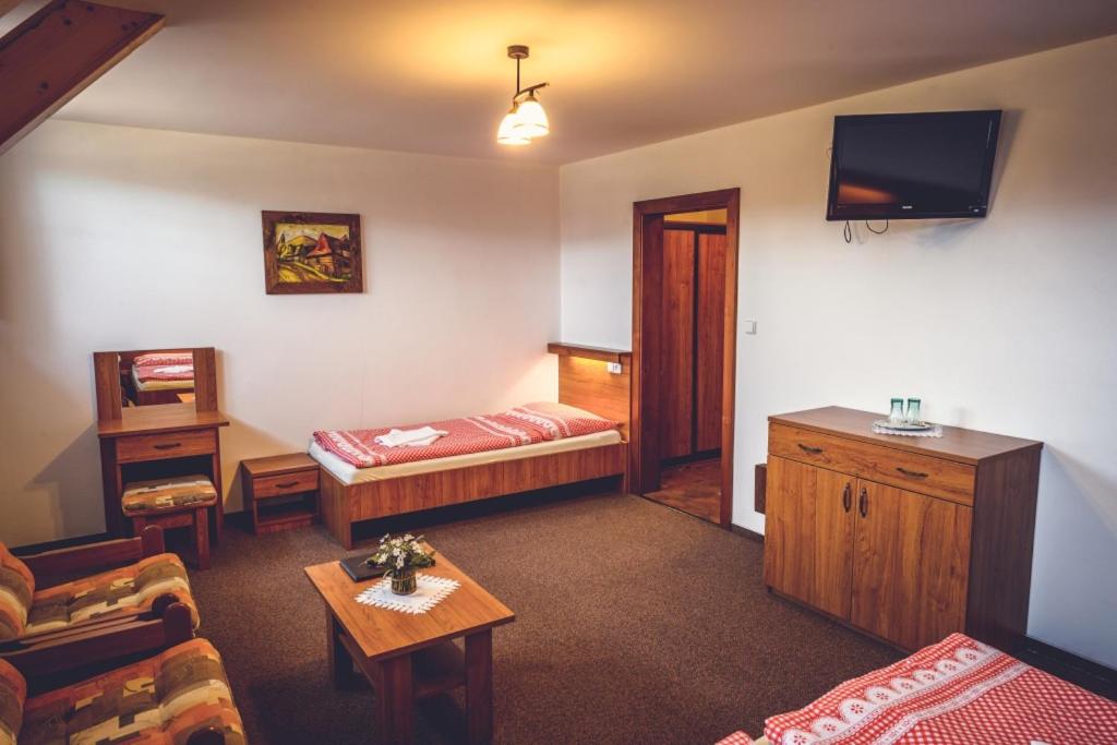 Posteľ alebo postele v izbe v ubytovaní Penzion Pribisko