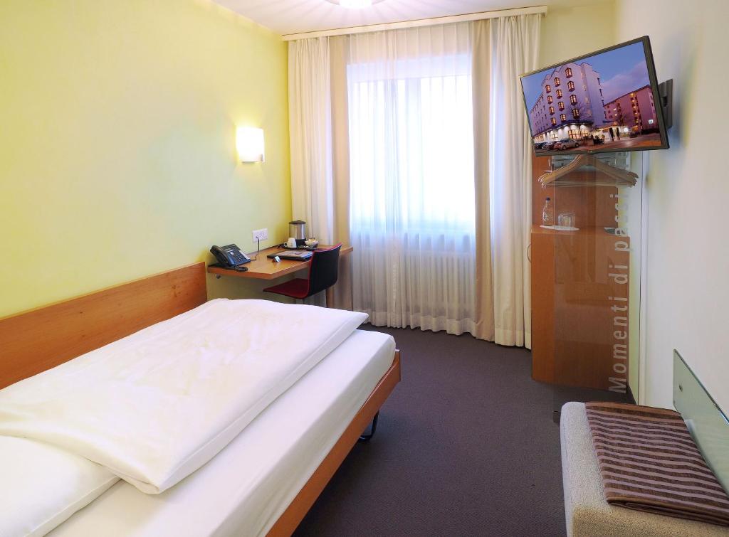 TV a/nebo společenská místnost v ubytování Sommerau-Ticino Swiss Quality Hotel