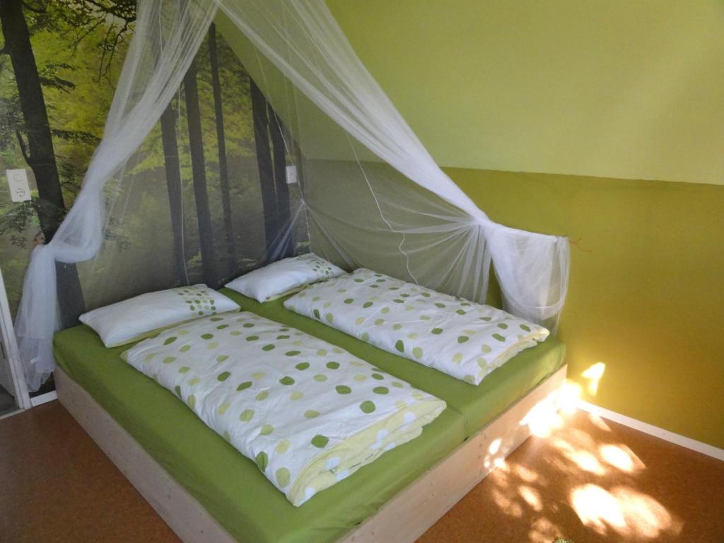 Postel nebo postele na pokoji v ubytování Peanuts Hostel & Meer