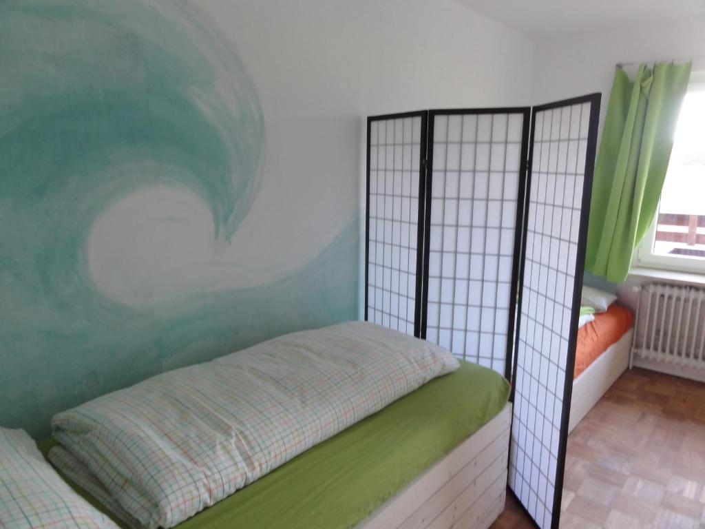 Postel nebo postele na pokoji v ubytování Peanuts Hostel & Meer