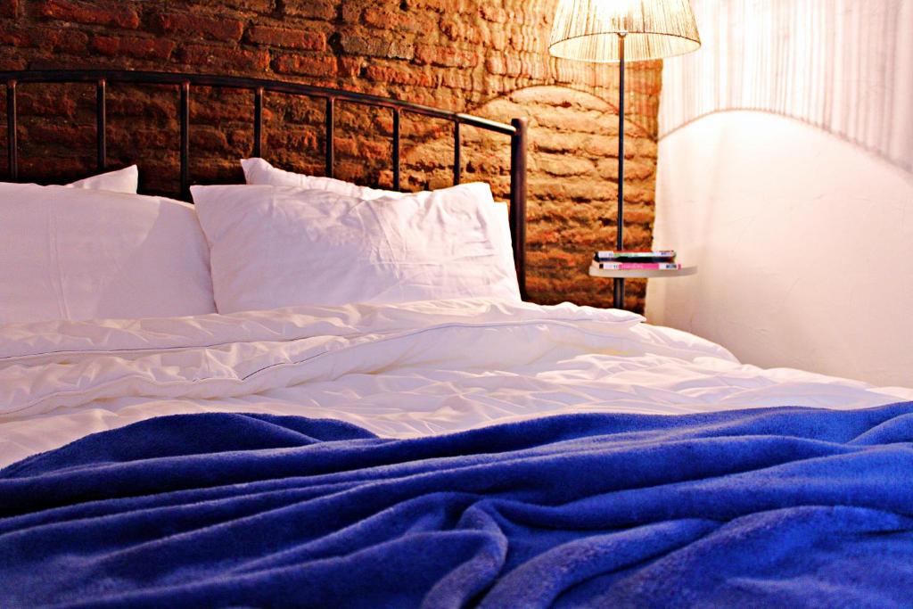Postel nebo postele na pokoji v ubytování Maria's homestay