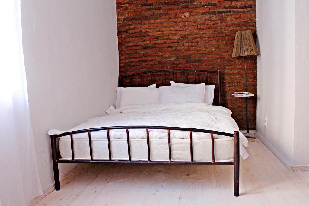 Postel nebo postele na pokoji v ubytování Maria's homestay