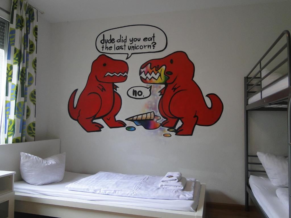 Postel nebo postele na pokoji v ubytování StayInn Hostel und Gästehaus