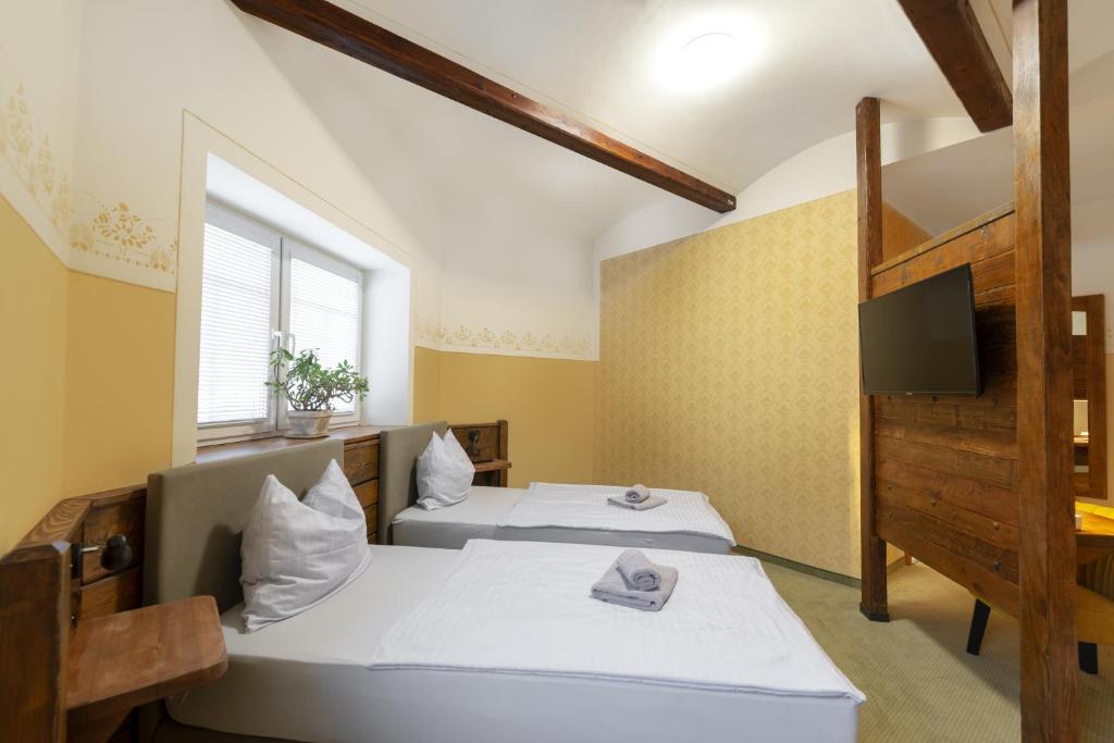 Cama o camas de una habitación en Hotel U Simla