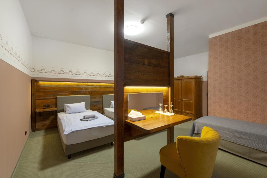 Cama o camas de una habitación en Hotel U Simla