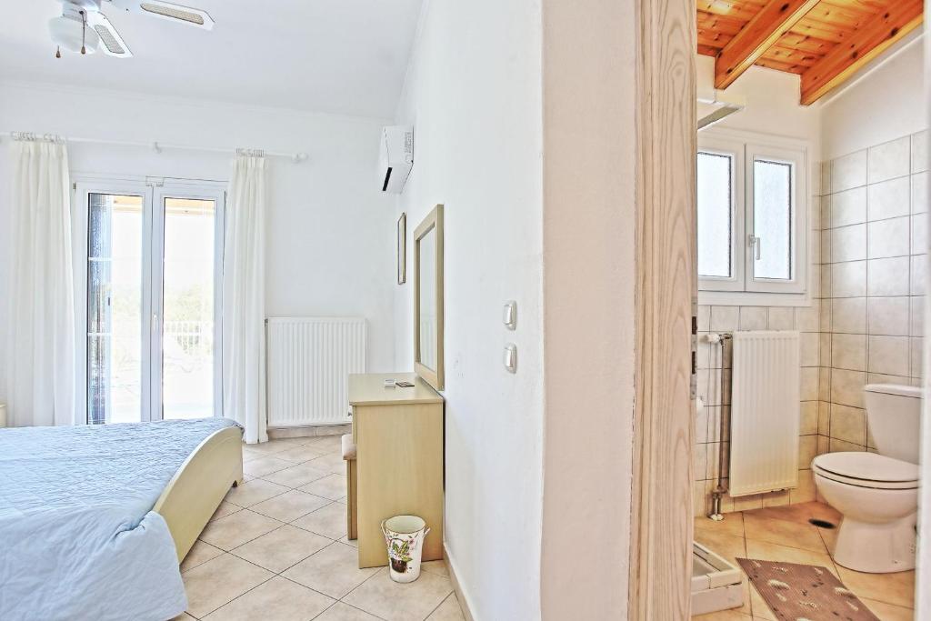 Koupelna v ubytování Beach Villa Oneiro