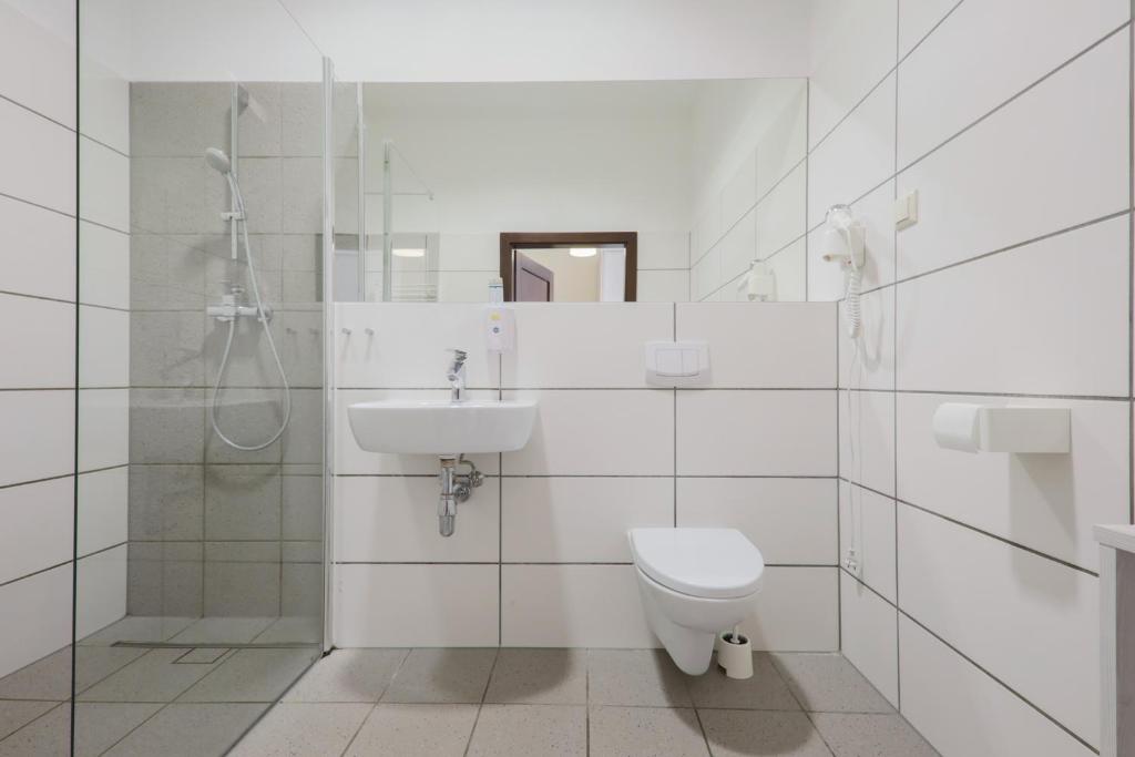 Kúpeľňa v ubytovaní Kamienica Pod Aniołami