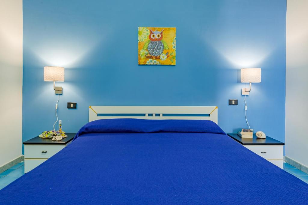 Postel nebo postele na pokoji v ubytování Lumia Case Vacanze