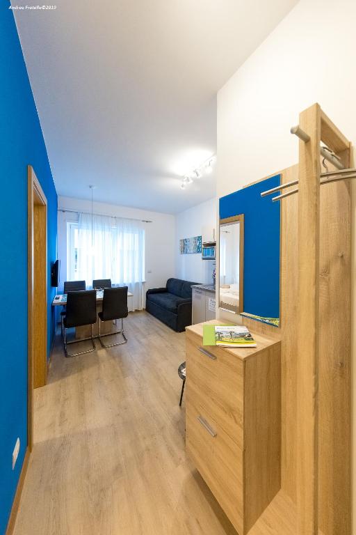 A kitchen or kitchenette at City Charme Apartments