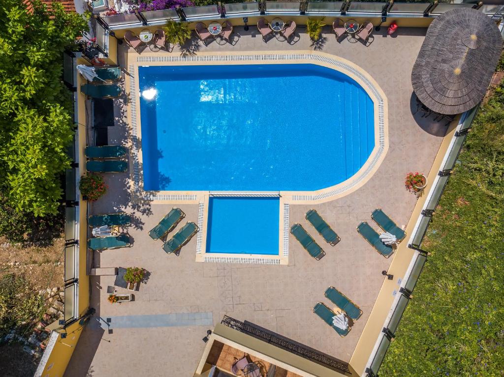 Bazén v ubytování Corfu Secret Hotel nebo v jeho okolí