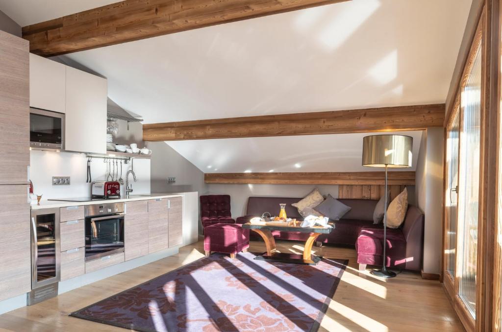 Kuchyň nebo kuchyňský kout v ubytování Chamois d'Or Hotel