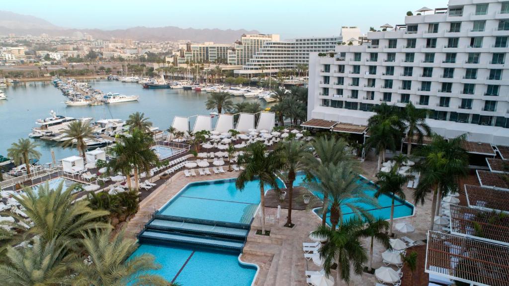 an aerial view of a hotel with a pool at King Solomon by Isrotel Collection in Eilat