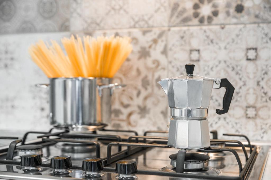 Coffee and tea making facilities at La Fiaba Roma Apartment