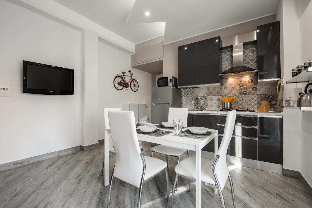 A kitchen or kitchenette at La Fiaba Roma Apartment