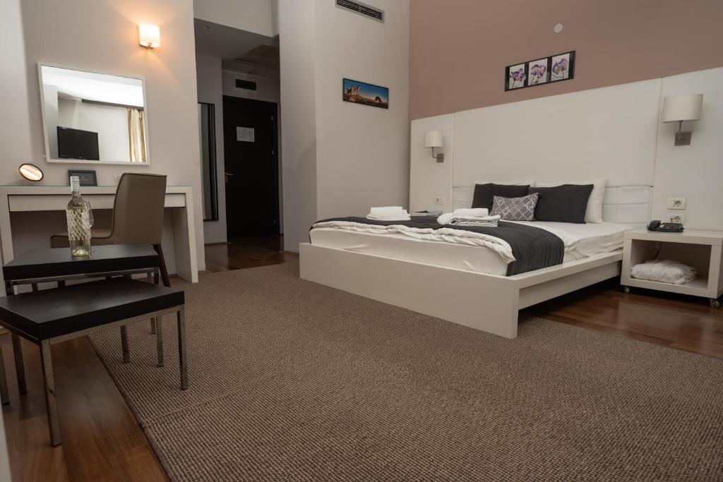 Postel nebo postele na pokoji v ubytování Hotel Dolce International