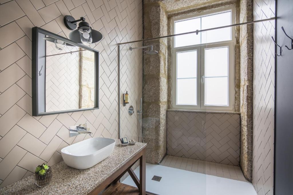Uma casa de banho em Casa das Muralhas