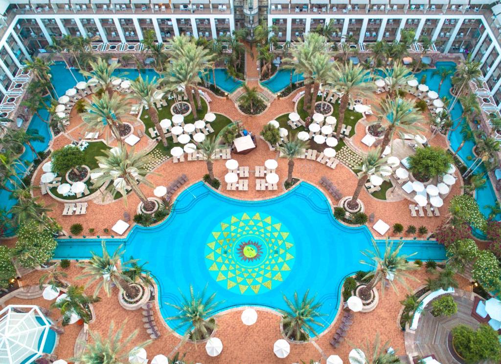 an aerial view of a resort with a pool at Agamim by Isrotel Collection in Eilat