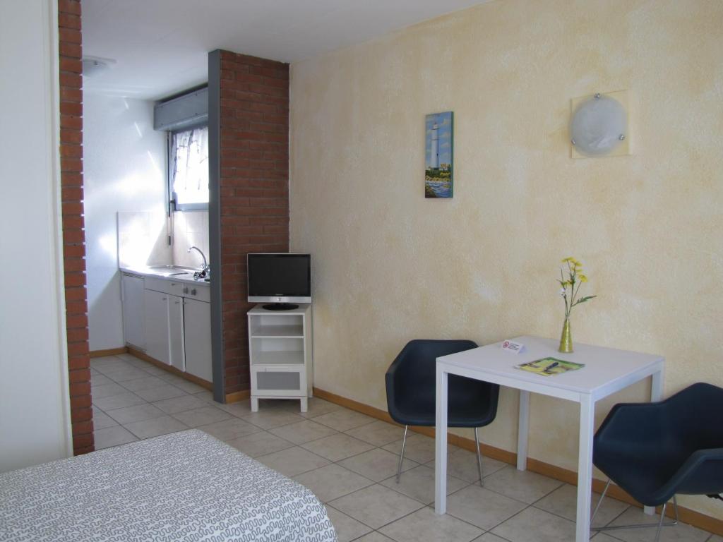TV a/nebo společenská místnost v ubytování Residence Tell