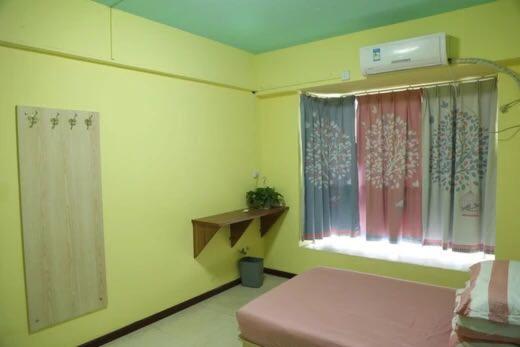 Postel nebo postele na pokoji v ubytování Wuhan Worry-free Capsule Hotel
