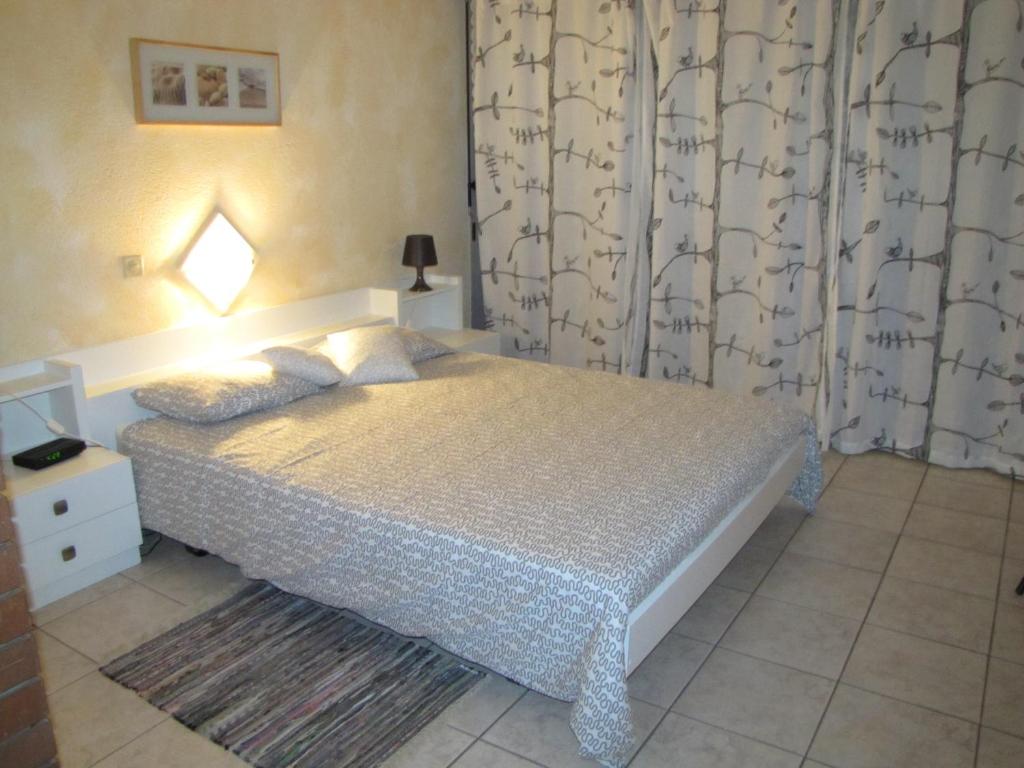 Postel nebo postele na pokoji v ubytování Residence Tell