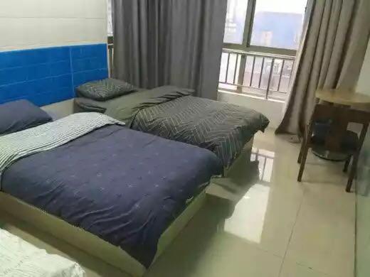 Postel nebo postele na pokoji v ubytování Wuhan Worry-free Capsule Hotel