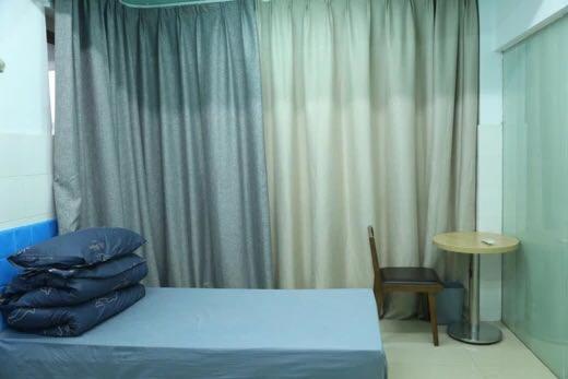 Postel nebo postele na pokoji v ubytování Wuhan Worry-free Capsule Hotel