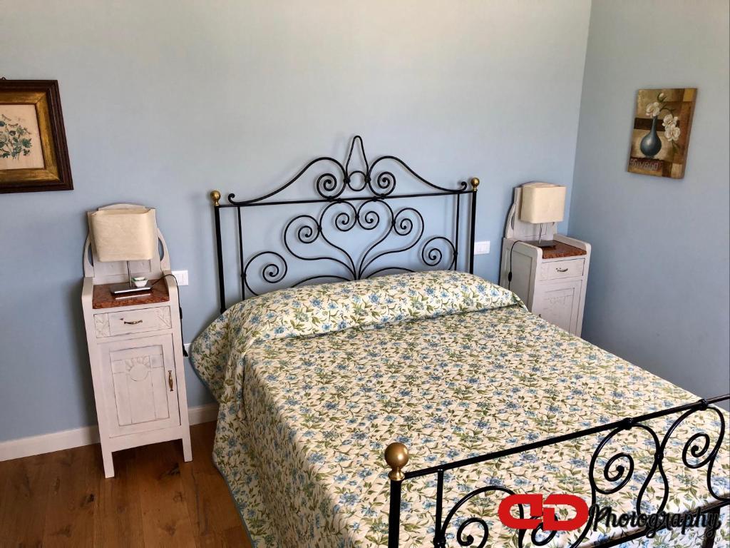 Posteľ alebo postele v izbe v ubytovaní B&B Orsobigio