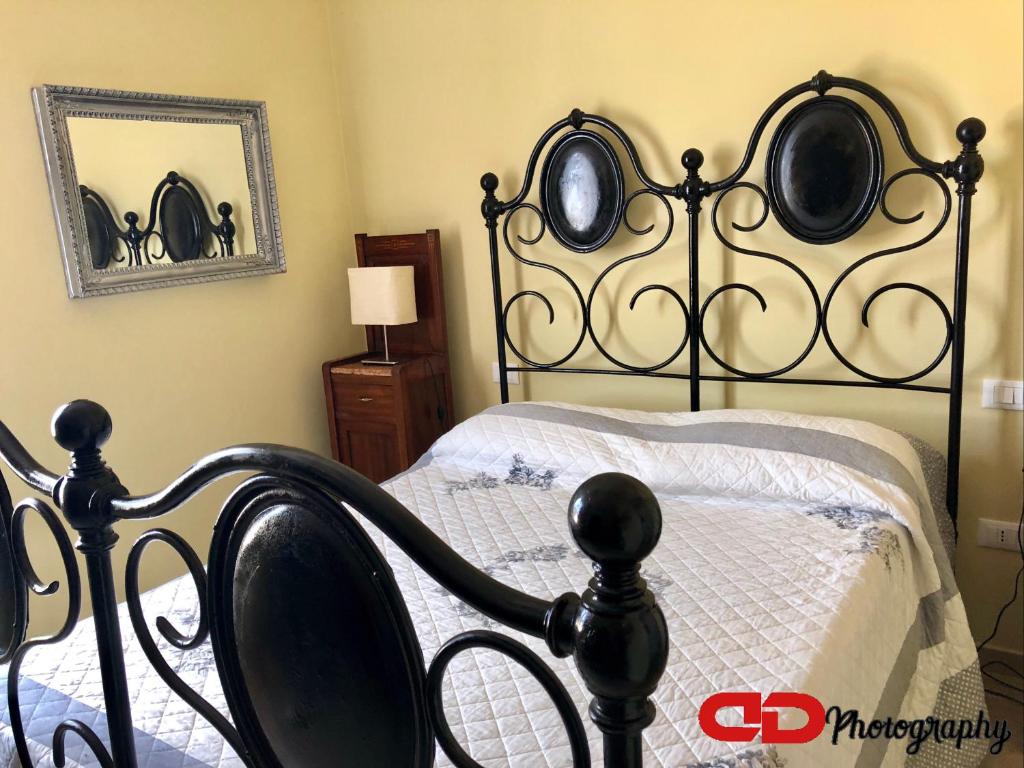 Posteľ alebo postele v izbe v ubytovaní B&B Orsobigio