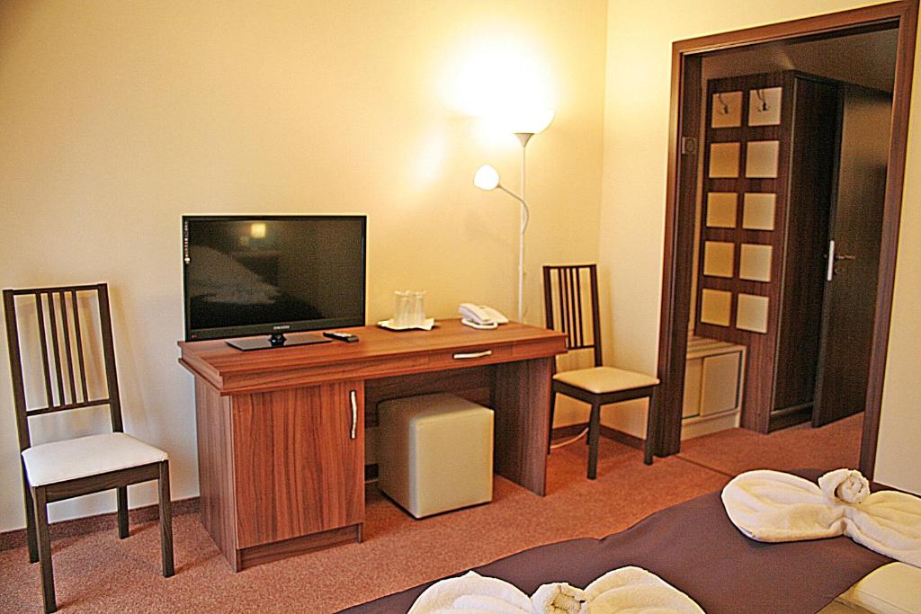 TV a/nebo společenská místnost v ubytování Vila Silvia