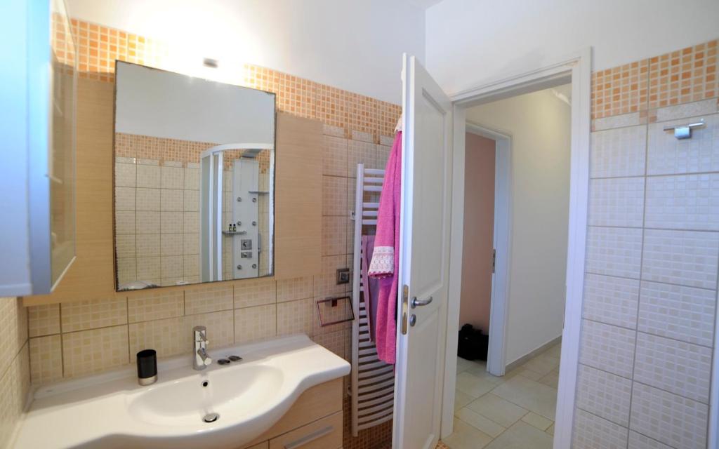 Kúpeľňa v ubytovaní Villa Busho