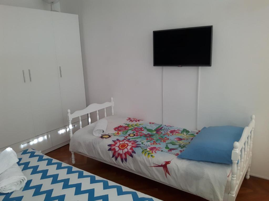 Postel nebo postele na pokoji v ubytování Tajc Rooms