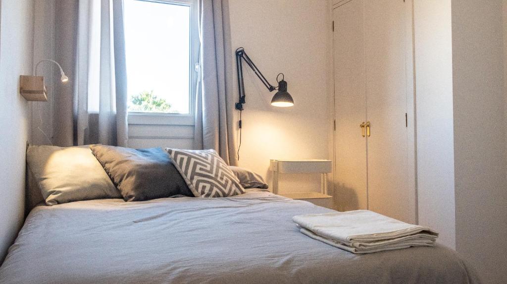 Postel nebo postele na pokoji v ubytování Apartamento Cadiz Paradiso
