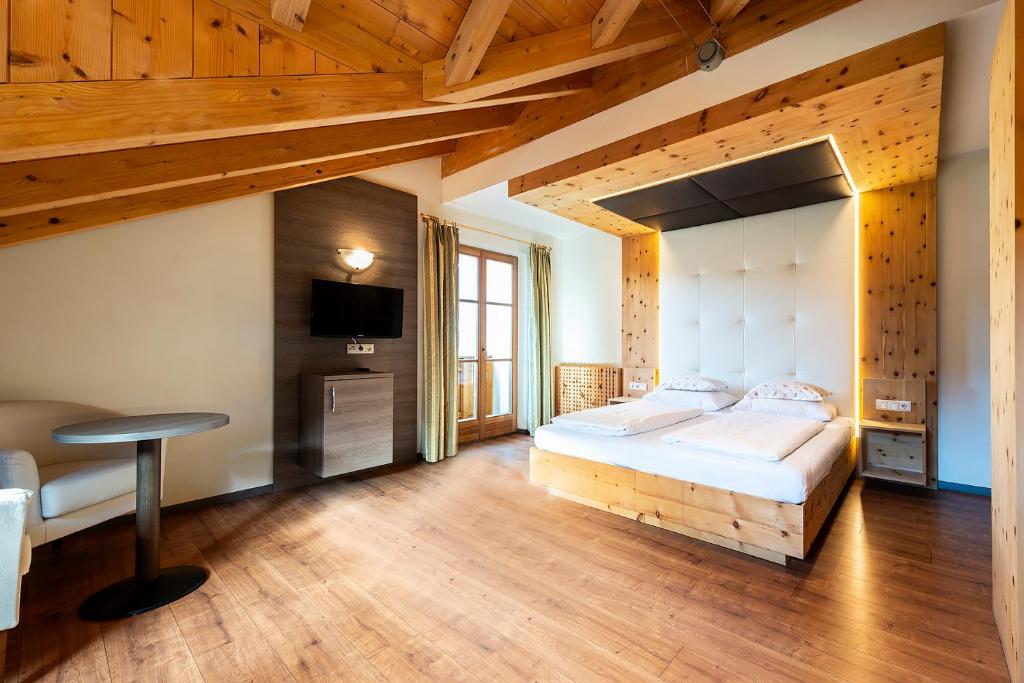 Postel nebo postele na pokoji v ubytování Hotel Waldheim