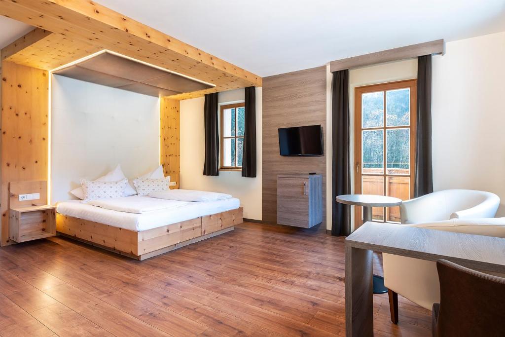 Postel nebo postele na pokoji v ubytování Hotel Waldheim