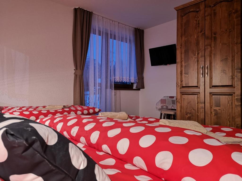 Postel nebo postele na pokoji v ubytování Privát Bachleda Ždiar