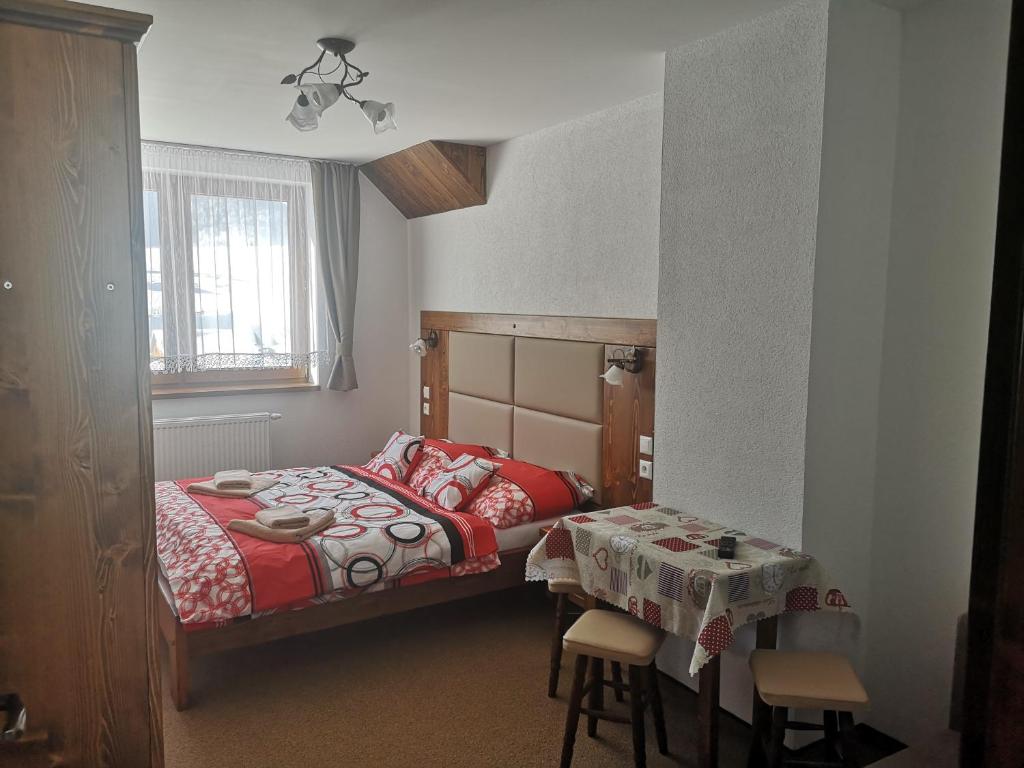 Postel nebo postele na pokoji v ubytování Privát Bachleda Ždiar