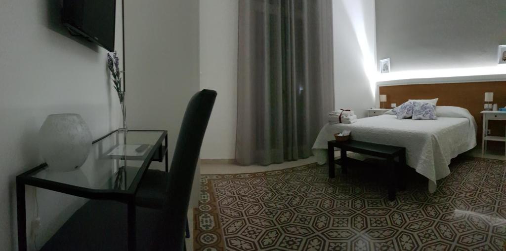 TV a/nebo společenská místnost v ubytování Aziz b&b