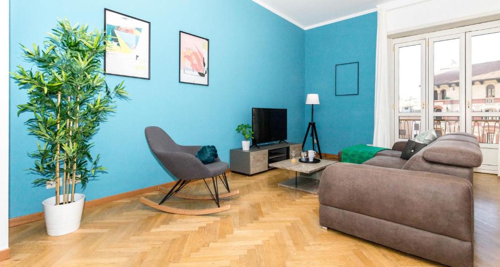 Telewizja i/lub zestaw kina domowego w obiekcie JOIVY Lovely Family Apt for 7 near San Lorenzo Columns