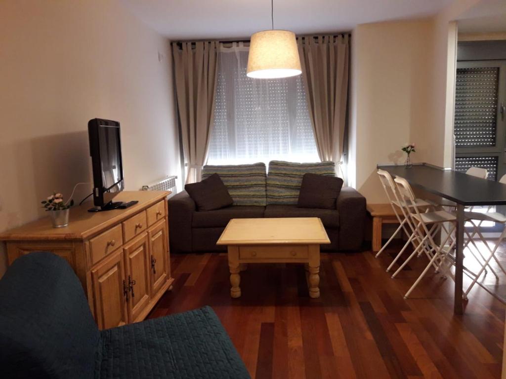 A seating area at Apartamento en c/ Peroneros