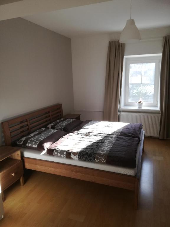 Postel nebo postele na pokoji v ubytování Lipanka