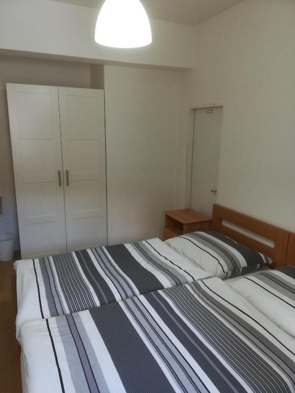 Postel nebo postele na pokoji v ubytování Lipanka