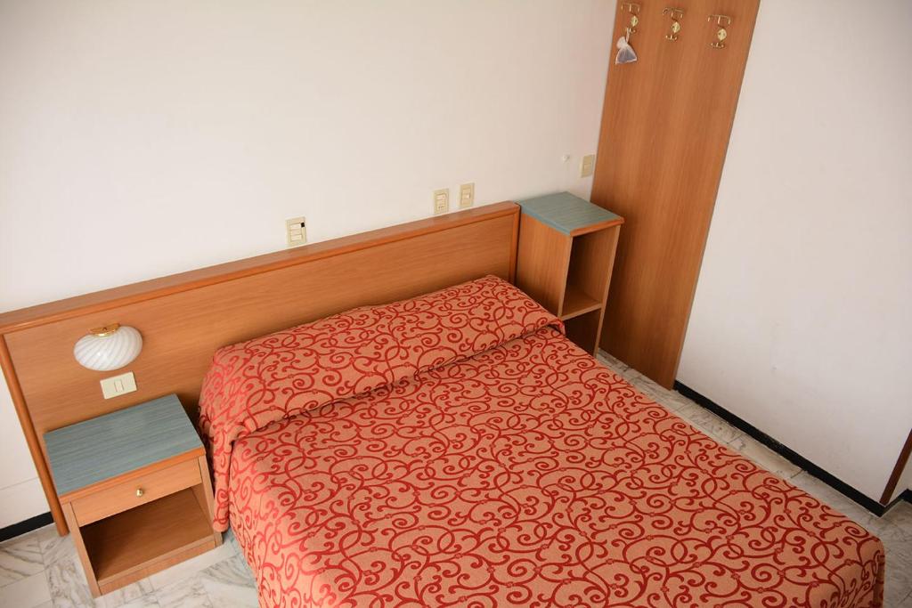 Postel nebo postele na pokoji v ubytování Hotel Valentino