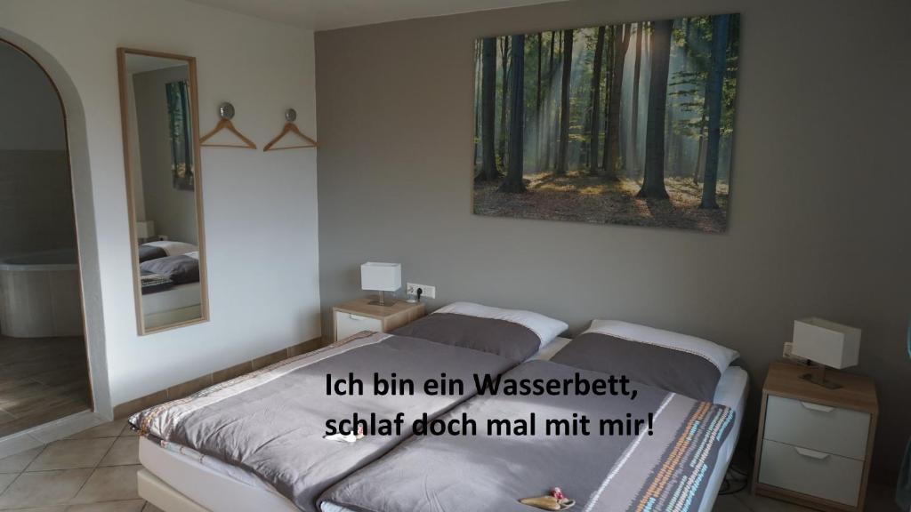 Postel nebo postele na pokoji v ubytování Ferienhaus am Rehberg