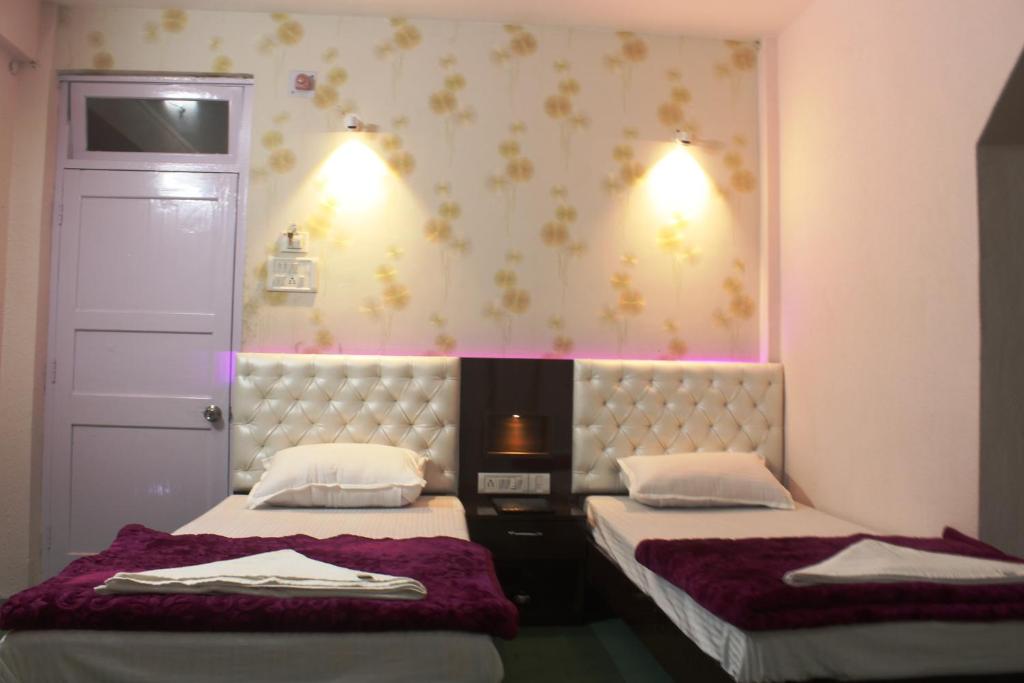 Postel nebo postele na pokoji v ubytování Hotel Paradiso