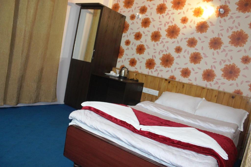 Postel nebo postele na pokoji v ubytování Hotel Paradiso