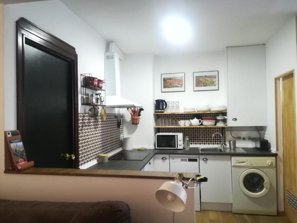 Kuchyň nebo kuchyňský kout v ubytování Apartamento Polo Flat