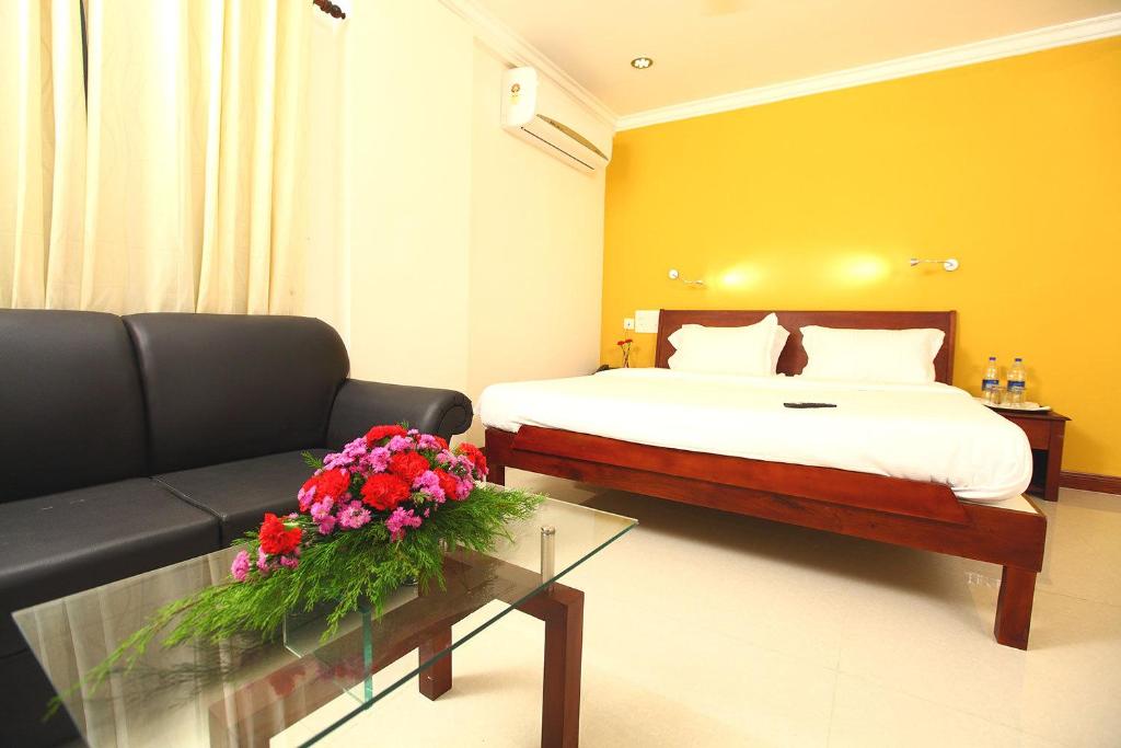 Postel nebo postele na pokoji v ubytování Hotel Pearl Palace