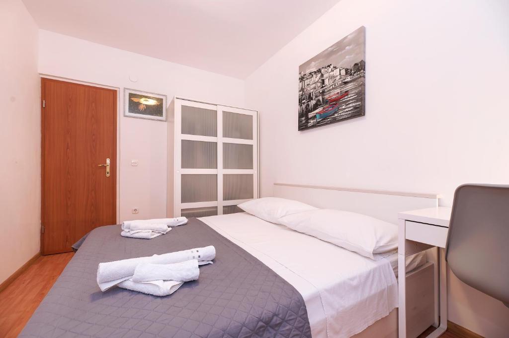 Posteľ alebo postele v izbe v ubytovaní Apartment Andrina